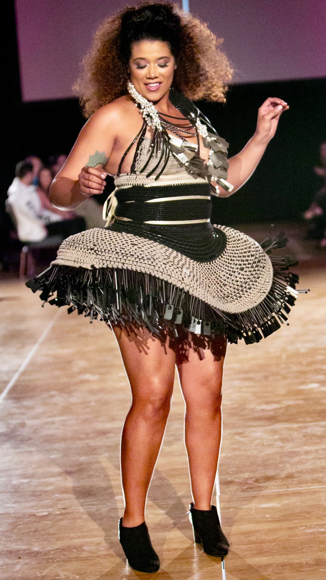 Model wearing recycled fashion at the Ecolution Fashion Show