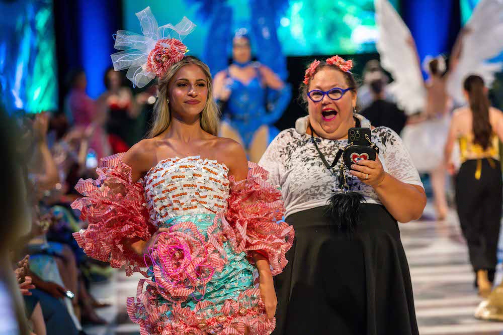 Ecolution 2025 Designer: Suz Pisano Wrap It Up! I'll Take It! (Candy Wrappers Sponsored by Grampa Joe's Candy Shop and Repurposed LED Lights) Model: Alaina Barlock Elan Mizrahi Photography